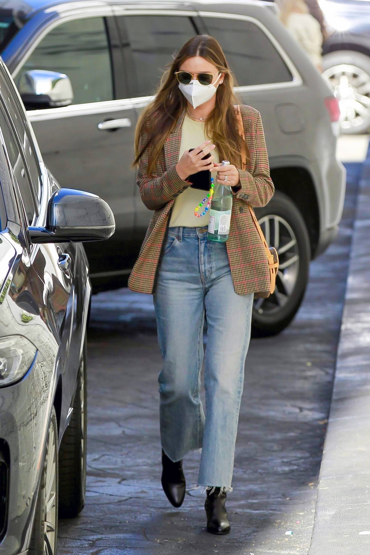 Miranda Kerr looks chic in a brown blazer with Louis Vuitton bag while  visiting a dermatology