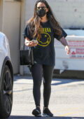 Olivia Munn sports black leggings with 'Nirvana' tee as she leaves her gym in West Hollywood, California