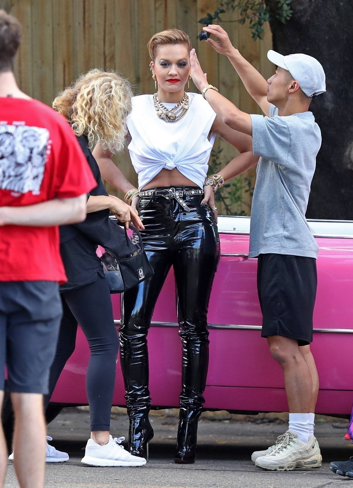 rita ora stuns in skin-tight leather pants while posing with a