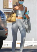 Eiza Gonzalez looks fab in a cropped white tee and grey legging shorts  during a coffee