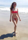 Blanca Blanco slips into a red bikini as she hits the beach in Malibu, California