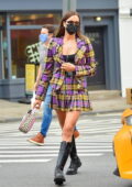 Irina Shayk looks stunning in a colorful paid mini skirt with matching blazer while out in New York City