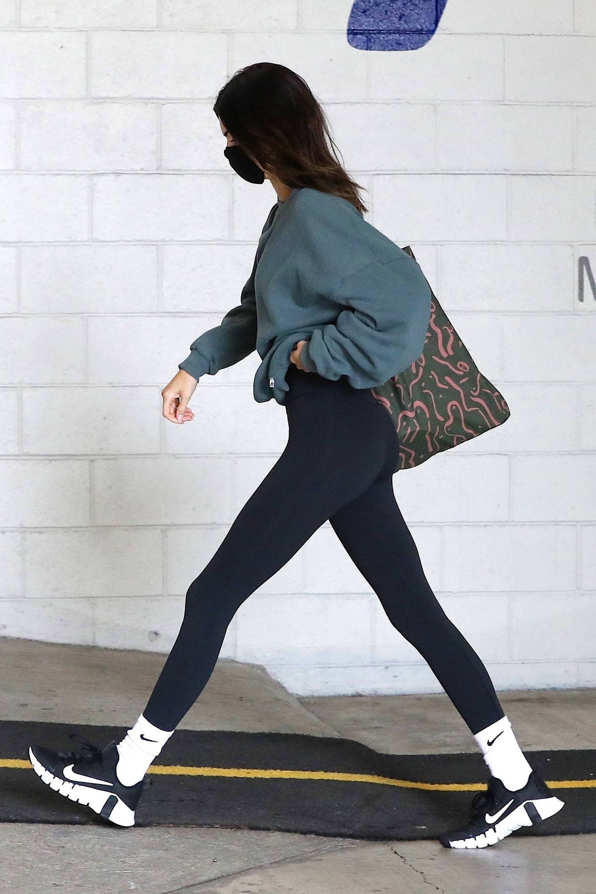 kendall jenner sports a black sweatshirt with matching leggings while  shopping at goyard in beverly hills, los angeles-101219_3