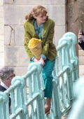 Emma Corrin is playful between takes as she films 'My Policeman' with Harry Styles in Brighton, UK