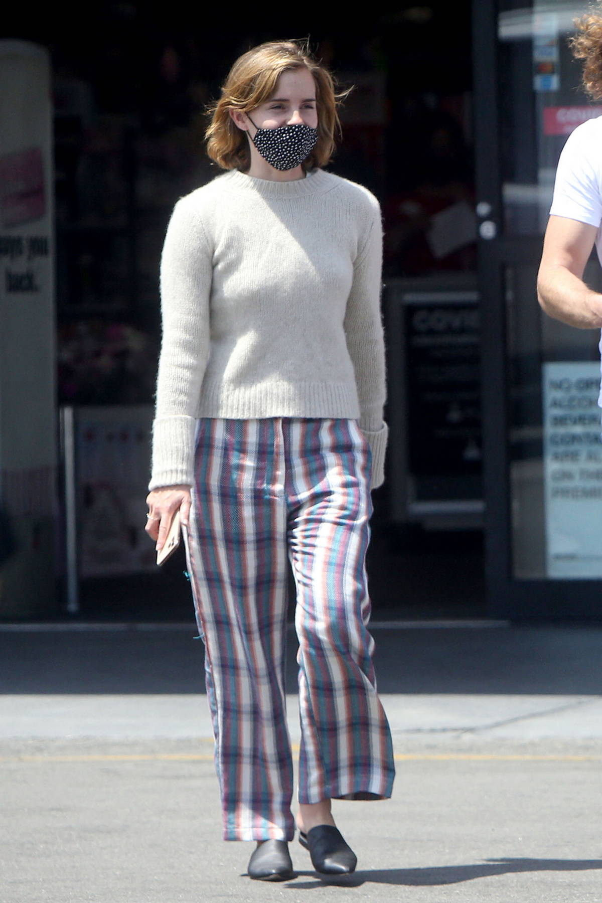 Emma Watson dresses down in checkered pants while stopping by a CVS with  boyfriend Leo Robinton