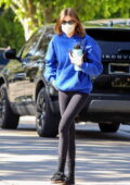 Kaia Gerber wears a blue hoodie and black leggings for her morning Pilates  class in West Hollywood, California
