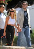 Sofia Richie and her boyfriend Elliot Grainge hold hands after a lunch date at Taverna Tony in Malibu, California