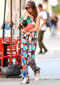 Emily Ratajkowski dons a colorful outfit while heading out with her son and husband in New York City