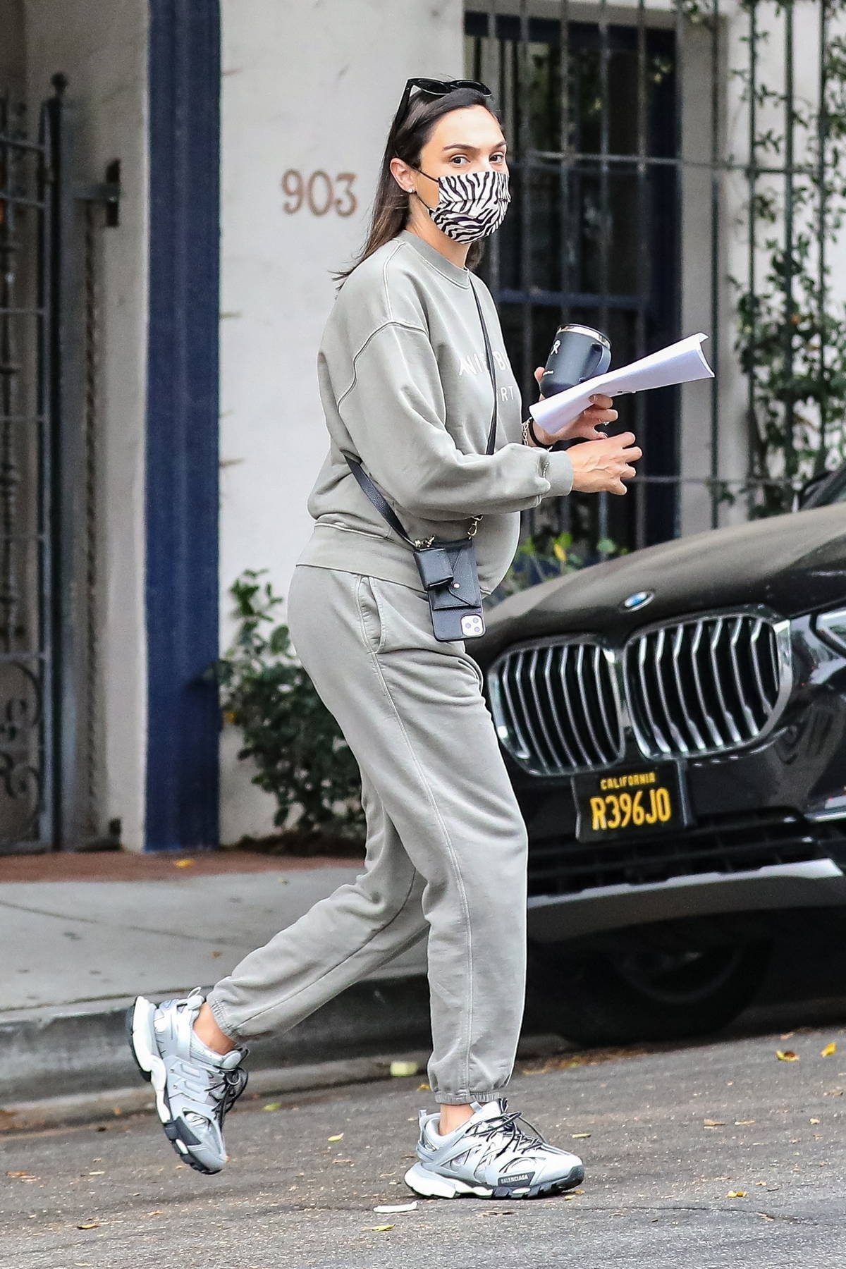 Gal Gadot stays cozy in a grey sweatsuit during a trip to Nine