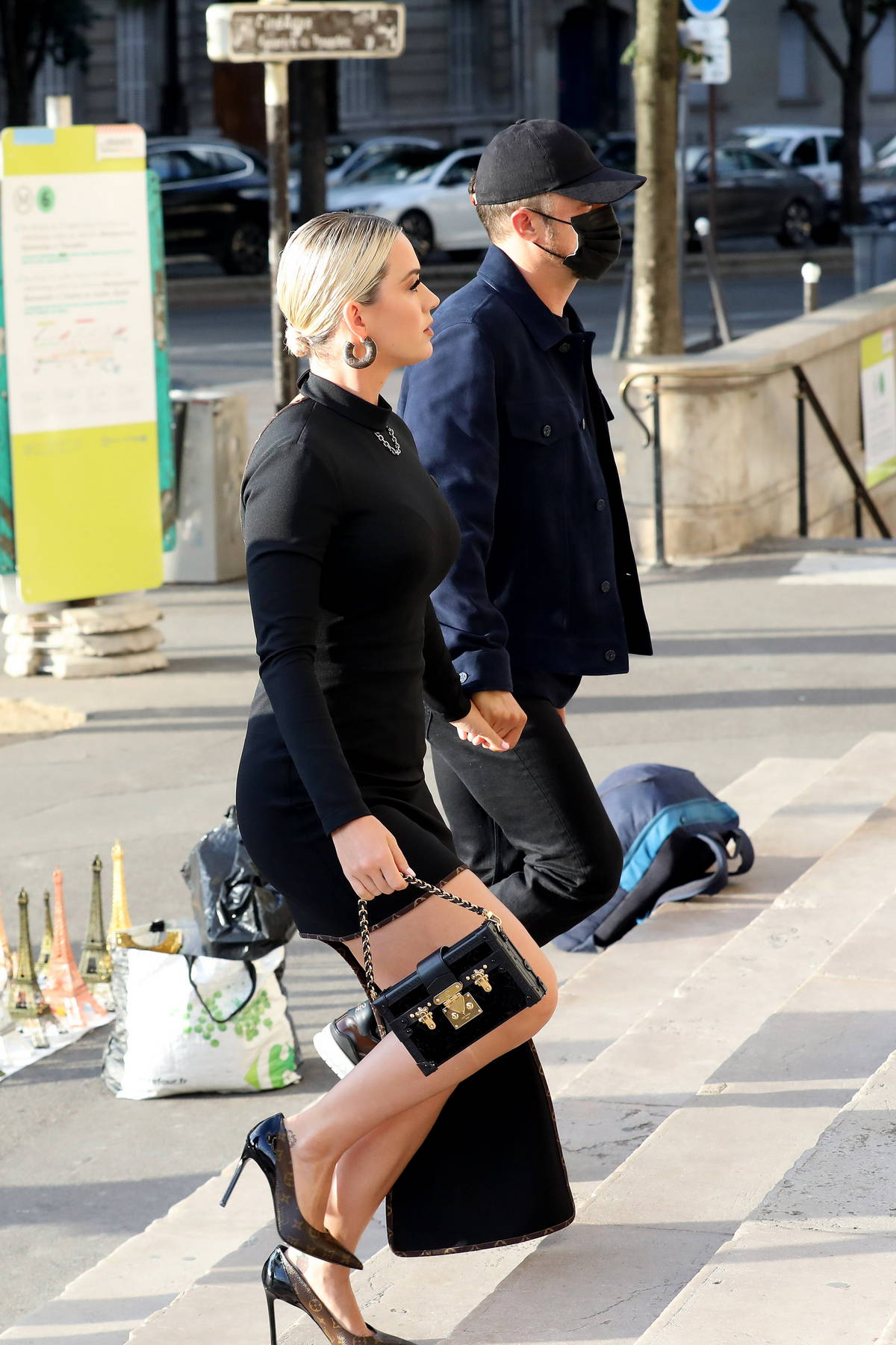 Katy Perry and fiancé Orlando Bloom exit swanky French restaurant during  stay in Paris