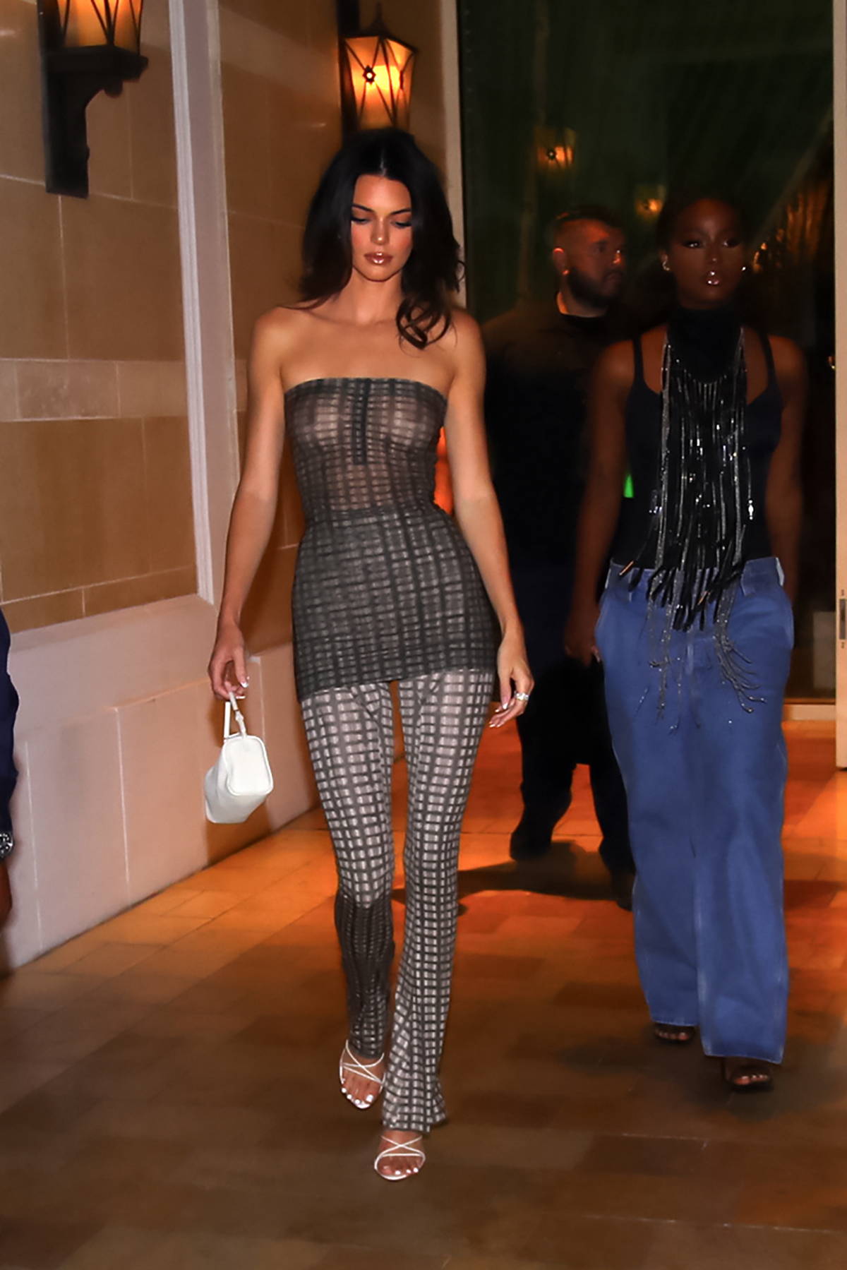 Kendall Jenner rocks a see-through outfit as she heads to grand opening of  Delilah in