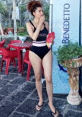 Blanca Blanco wears a black swimsuit while enjoying another day while on vacation in Sicily, Italy