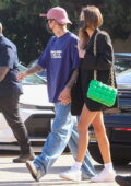 Hailey Bieber and Justin Bieber hold hands as they step out for dinner in Malibu, California