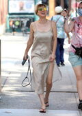 Kaley Cuoco wears a silver slip dress on the set of 'Meet Cute' in Brooklyn, New York City