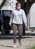 Kristen Bell dons a tie-dye sweatshirt and grey leggings while