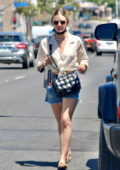 Lucy Hale looks cute in a knotted shirt and denim shorts while out running errands in Los Angeles