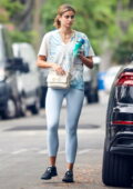 Taylor Hill rocks light blue leggings and tie-dye top while