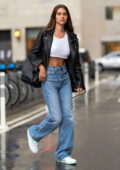 Amelia Hamlin flashes her abs in a white crop and jeans while out in New York City