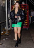 Ashley Benson flaunts some legs in a green mini skirt while stepping out for a night on the town in New York City