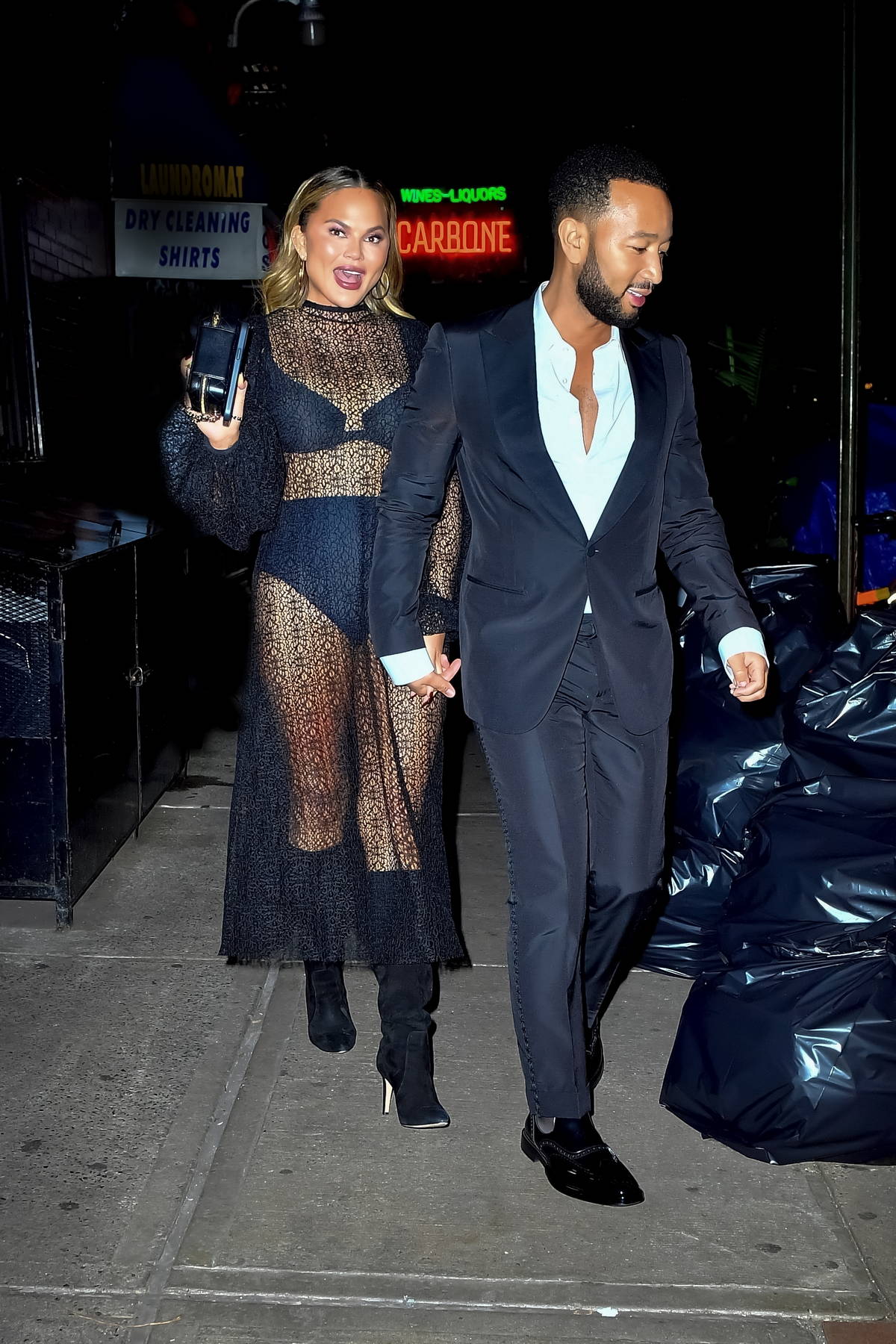 Chrissy Teigen Wore a Sheer Lacy Top for a Date Night at a Drake Concert