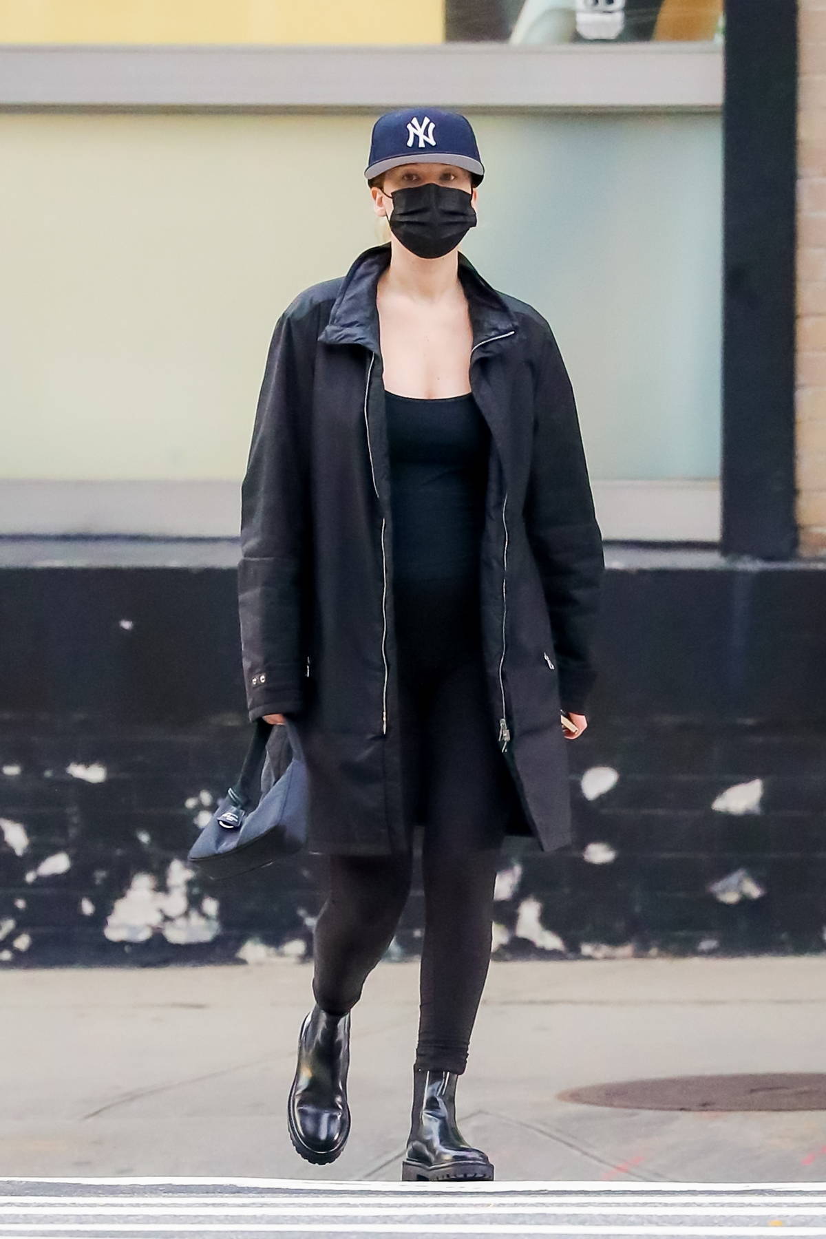 jennifer lawrence shows her baby bump in all-black jacket, top and leggings  while running a few errands in new york city-290921_7