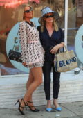 Paris Hilton poses with her mom while filming at Crumbs & Whiskers - Kitten & Cat Cafe on Melrose Ave in Los Angeles