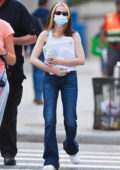 Zoey Deutch seen holding a folder while filming on the set of 'Not Okay' in New York City