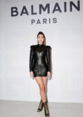 Amelia Hamlin attends the Balmain Festival during Paris Fashion Week in Boulogne-Billancourt, France