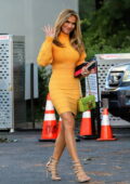 Chrishell Stause looks striking in an orange sweater dress as she wraps up filming 'Selling Sunset' in West Hollywood, California