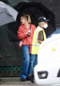 Kaley Cuoco seen wearing an orange puffer jacket while on the set of 'The Flight Attendant', Season 2 in Los Angeles