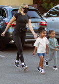 Khloe Kardashian flaunts her curves in skin-tight top and leggings while running errands in Calabasas, California