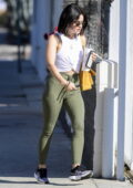 lucy hale looks athletic in olive green leggings and a white tank top while  out for a workout session in los angeles-141021_4