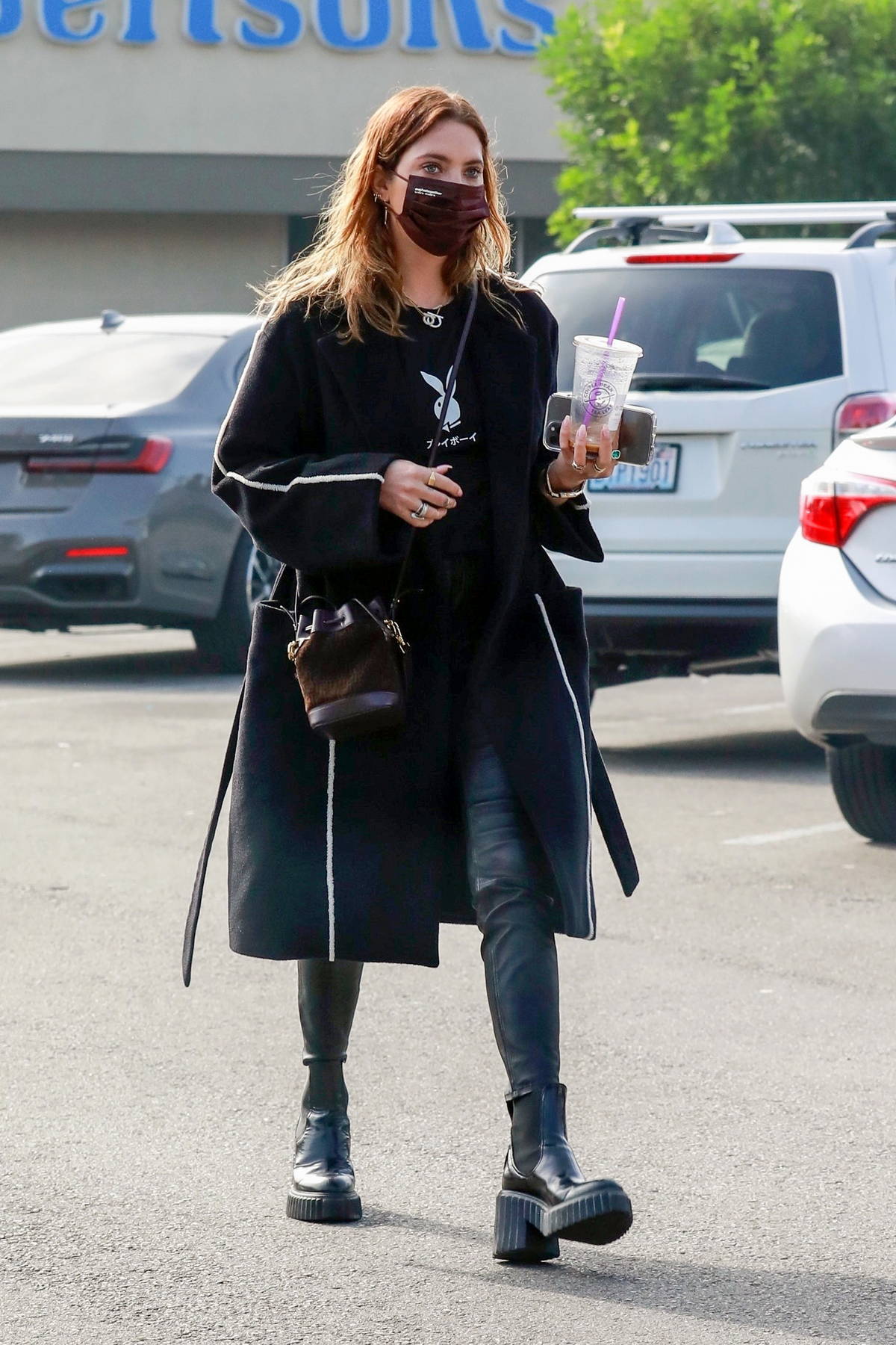 Ashley Benson Wears Long Coat and Mini Fendi Tote - West Hollywood