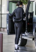 Kendall Jenner shows off her svelte figure in all-black crop top and  leggings while out for a business meeting in Los Angeles