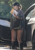 Addison Rae flaunts her legs in tiny denim shorts as she arrives at a friend's home in Beverly Hills, California