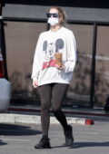Ashley Benson dons a Mickey Mouse sweatshirt and leggings while making a coffee run in Los Feliz, California