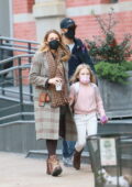 Blake Lively and Ryan Reynolds get all bundled up while out on a stroll with their daughter in New York City