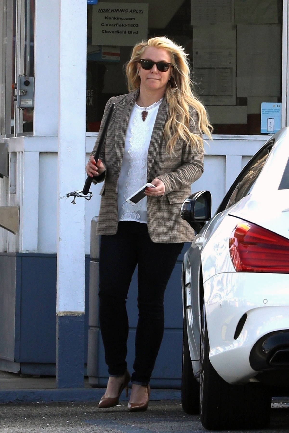 Britney Spears makes a rare appearance while stopping for a restroom