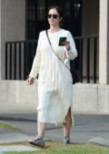 Minka Kelly looks radiant in a white sweater dress while running a few errands in Los Angeles