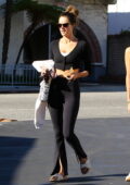 Alessandra Ambrosio sports a crop top and flared leggings while attending a  yoga class in Brentwood