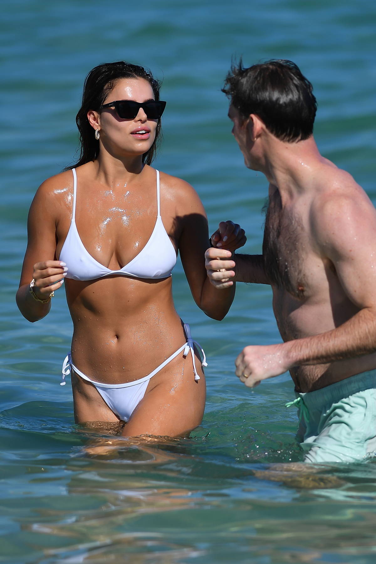 Brooks Nader shows off her incredible figure in tiny thong bikini as model  enjoys a day at the beach with hunky husband Billy Haire in Mexico