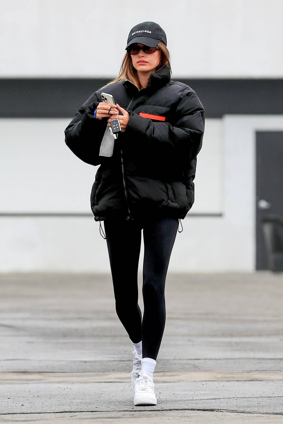 hailey bieber rocks a puffer jacket and leggings for her morning pilates  session in west hollywood, california-070122_9