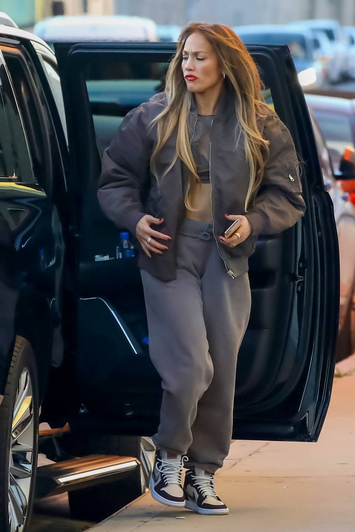 jennifer lopez wears a grey bomber jacket with matching sweats as she heads  to a dance studio in los angeles-270122_4