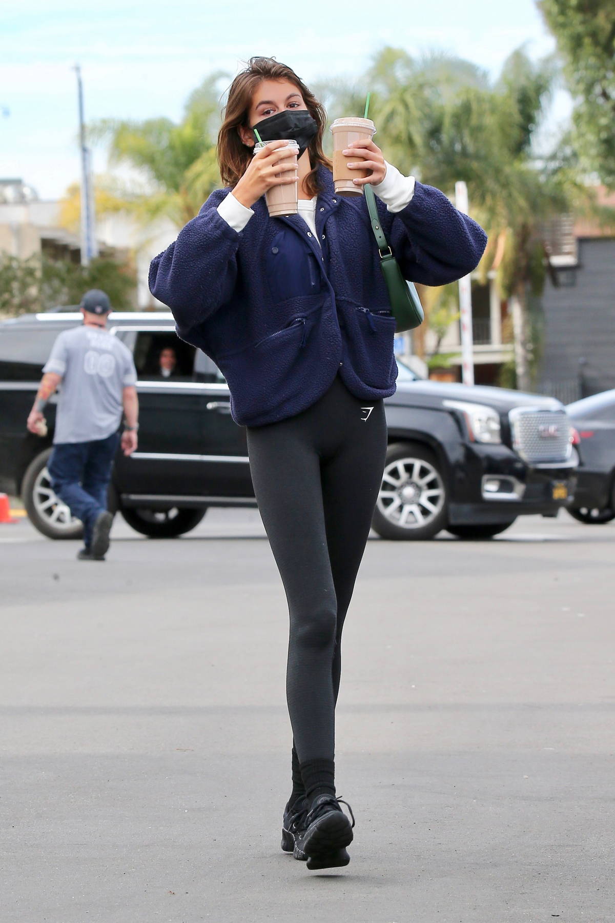 sara sampaio flashes her abs in cropped sweatshirt and leggings