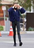 Kaia Gerber shows off her mile-long legs in black leggings while