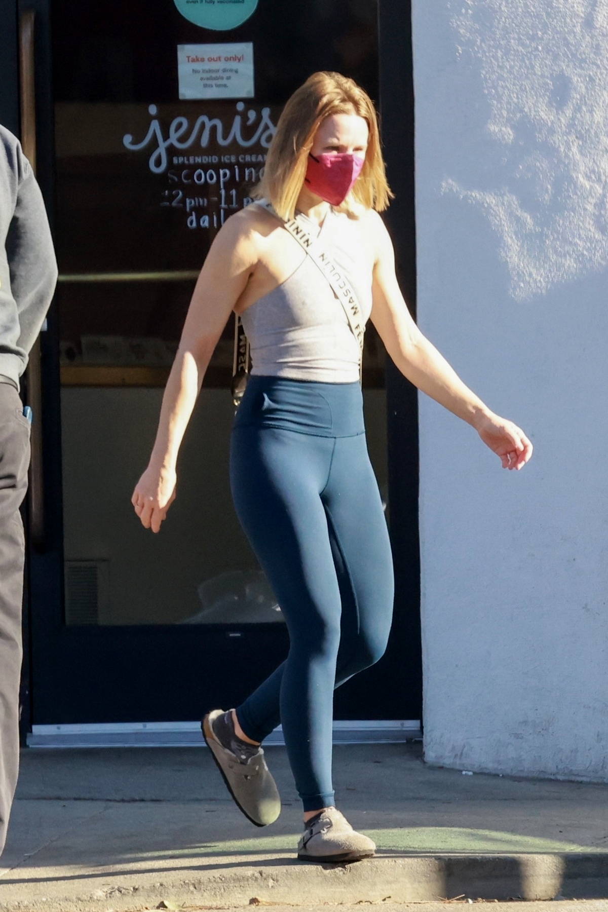 kristen bell looks athletic in a crop top and leggings as she hits
