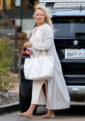 Pamela Anderson looks great in white while out for dinner with a friend in Malibu, California