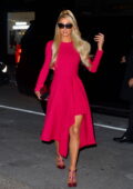 Paris Hilton looks pretty in a bright pink dress while heading to 'The Drew Barrymore Show' in New York City