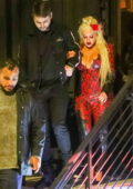 Christina Aguilera dazzles in a red jumpsuit while stepping out with beau Matthew Rutler for a night out in Los Angeles