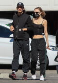 Lily-Rose Depp packs on the PDA with boyfriend Yassine Stein while out to lunch at Astro Burger in Los Angeles